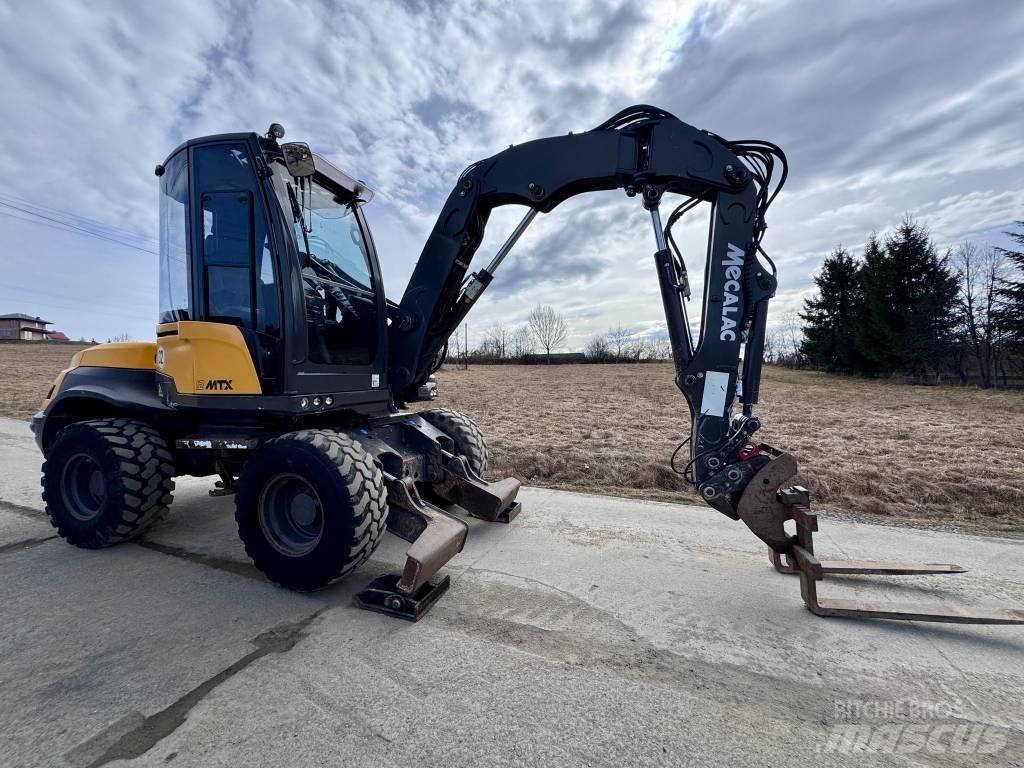 Mecalac 12 MTX Ekskavatori-iekrāvēji
