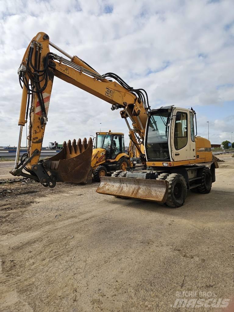 Liebherr 314 Ekskavatori uz riteņiem