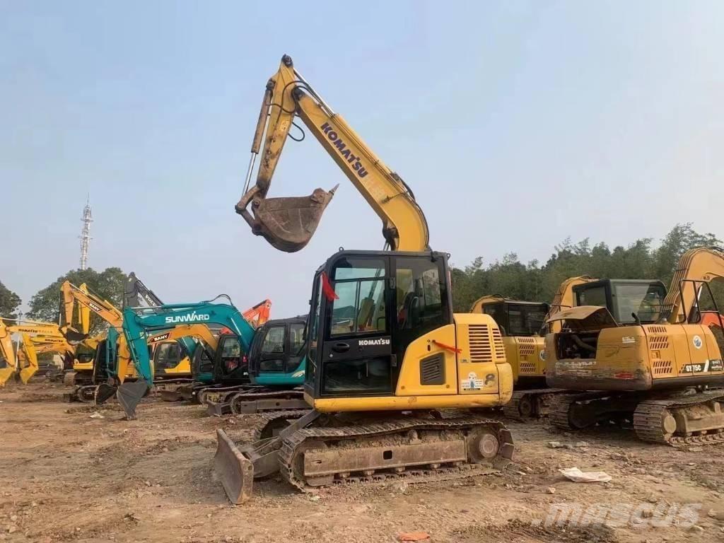 Komatsu PC 70 Vidēja lieluma ekskavatori 7 t - 12 t