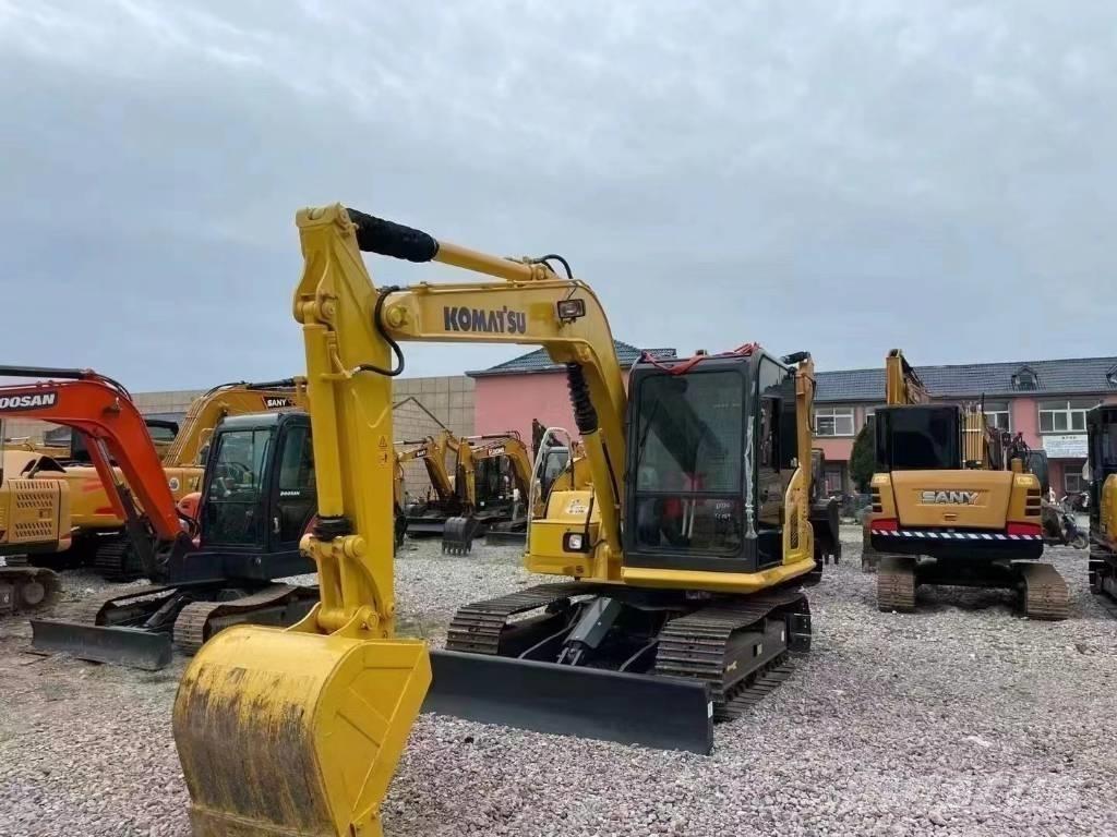 Komatsu PC 70 Vidēja lieluma ekskavatori 7 t - 12 t