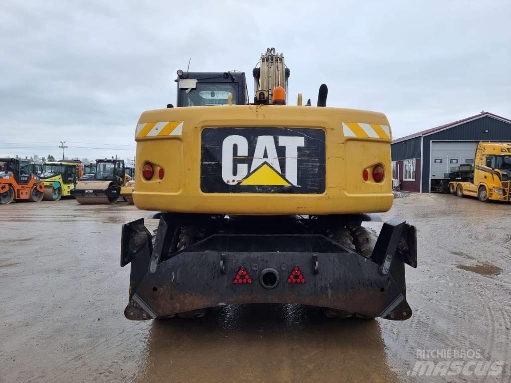 CAT M 315 D II Ekskavatori uz riteņiem