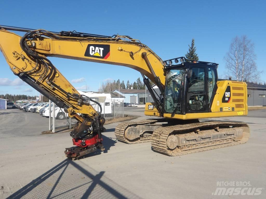 CAT 323 Kāpurķēžu ekskavatori