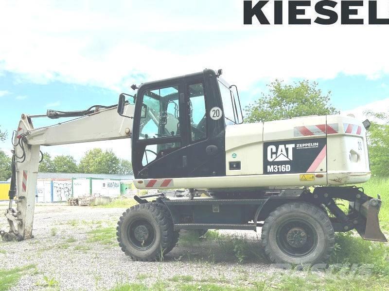 CAT M 316 D Ekskavatori uz riteņiem