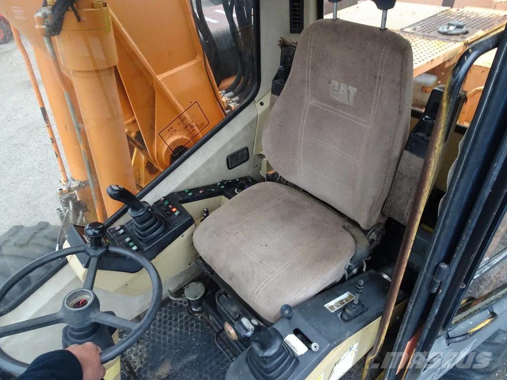 CAT M315 Ekskavatori uz riteņiem