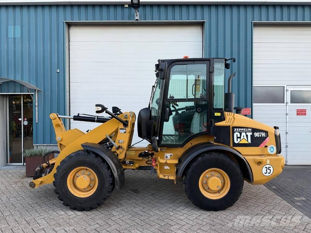 CAT 907 H Iekrāvēji uz riteņiem