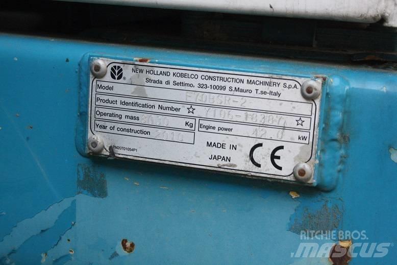 New Hollan E 70 BSR Vidēja lieluma ekskavatori 7 t - 12 t