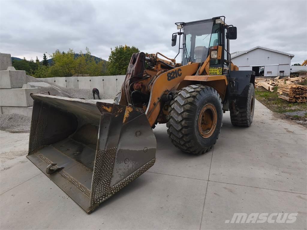 CASE 821C Būvniecība- Citi