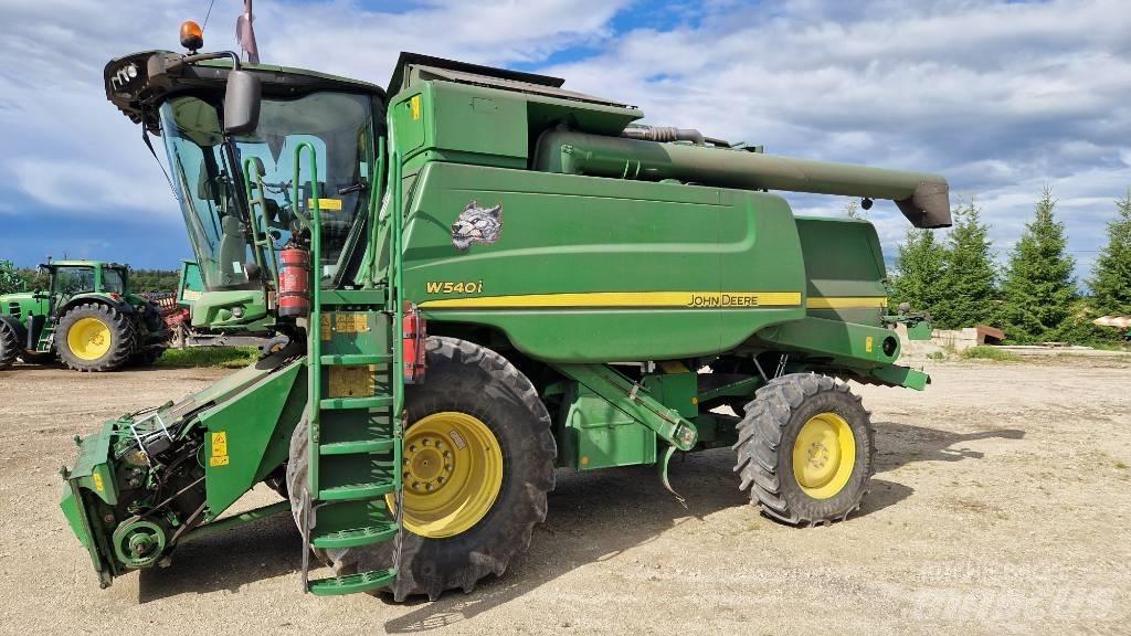 John Deere W 540 Ražas novākšanas kombaini