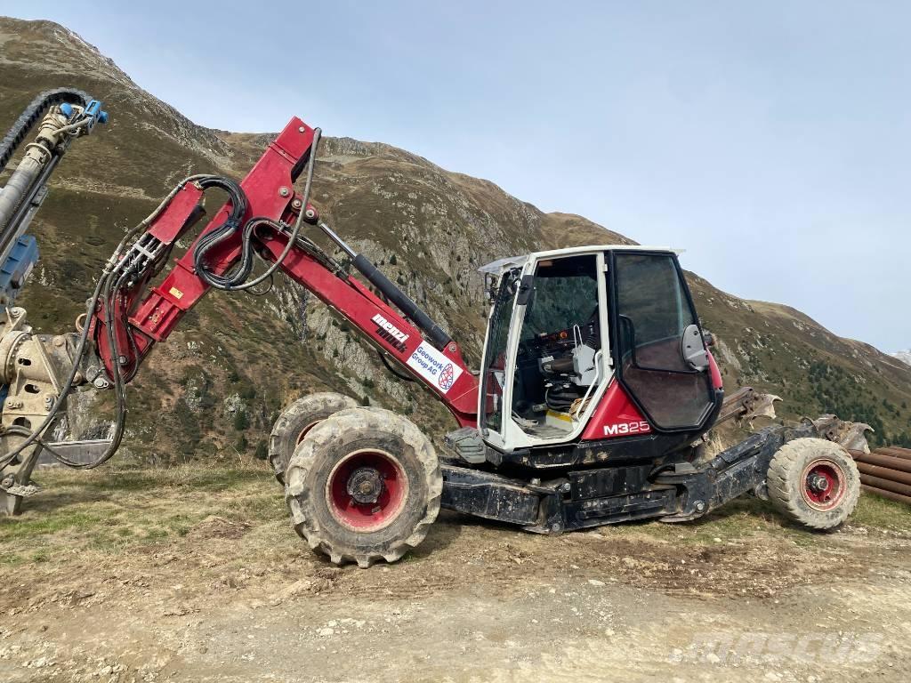 Menzi Muck 325 Ekskavatori uz riteņiem