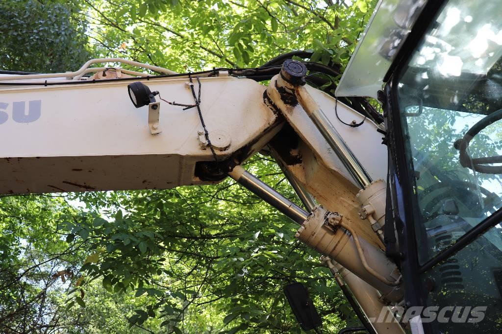 Komatsu PW 140-7 Ekskavatori-iekrāvēji