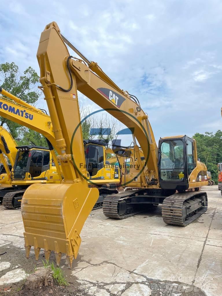 CAT 320C Vidēja lieluma ekskavatori 7 t - 12 t