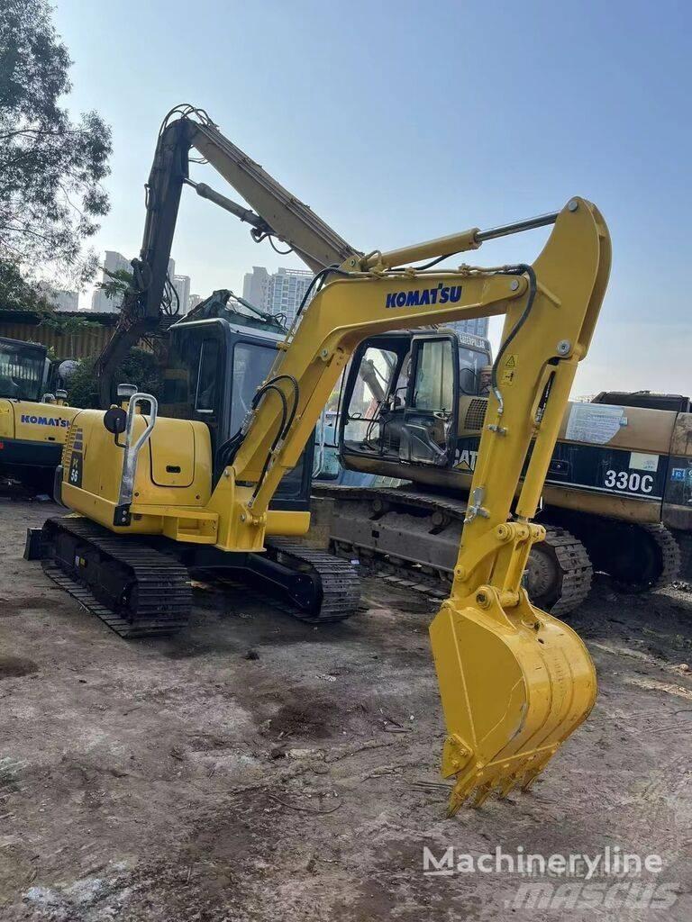 Komatsu PC56-7 Mobilie drupinātāji