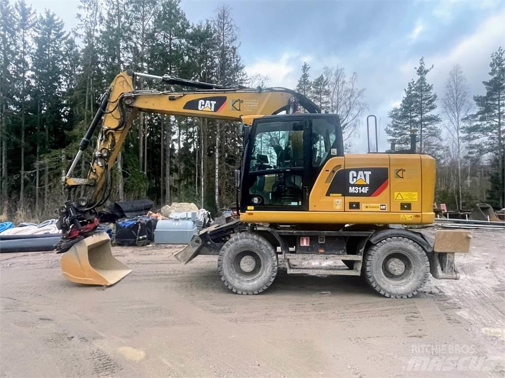 CAT M 314 F Ekskavatori uz riteņiem