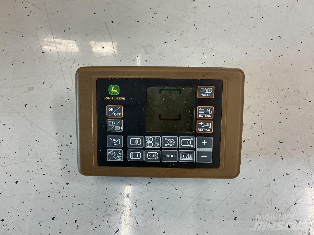 John Deere 644 Rituļu preses