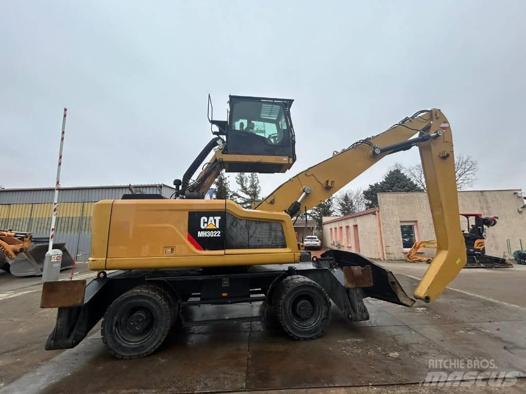 CAT MH3022 Ekskavatori uz riteņiem