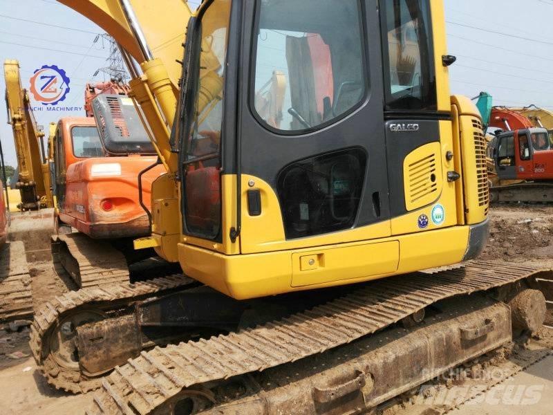 Komatsu PC 128 US Vidēja lieluma ekskavatori 7 t - 12 t
