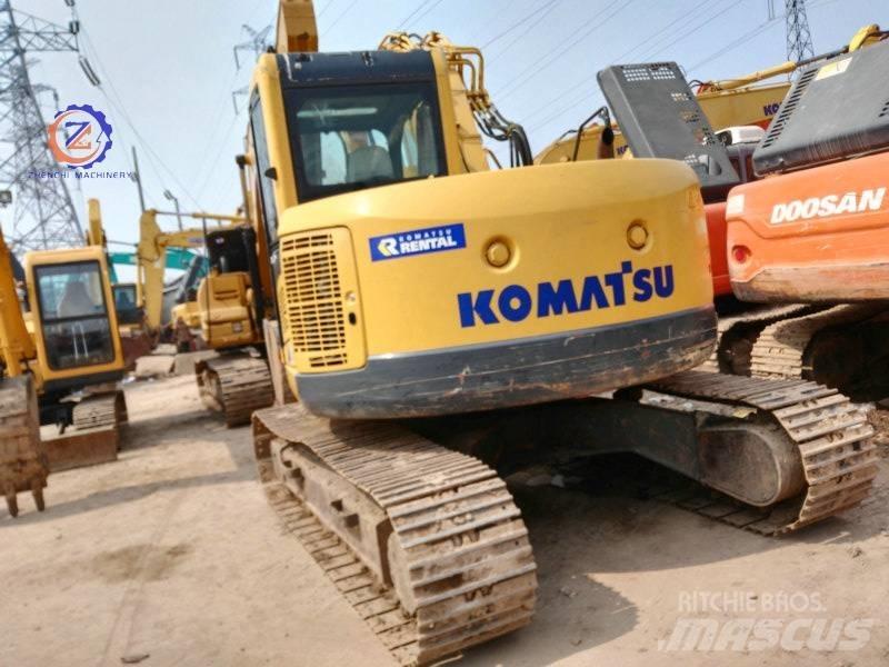 Komatsu PC 128 US Vidēja lieluma ekskavatori 7 t - 12 t
