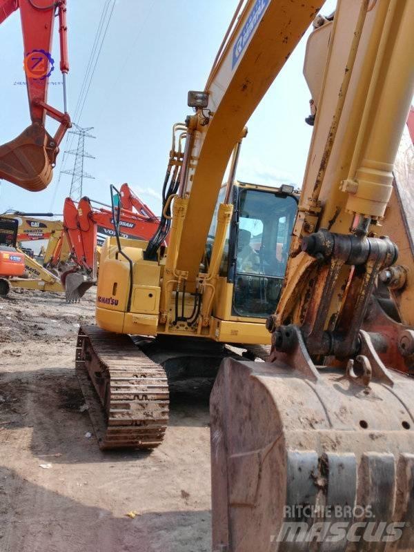 Komatsu PC 128 US Vidēja lieluma ekskavatori 7 t - 12 t