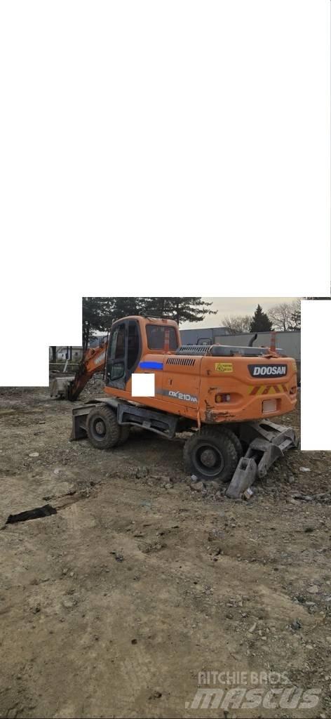 Doosan DX 210 W Ekskavatori uz riteņiem