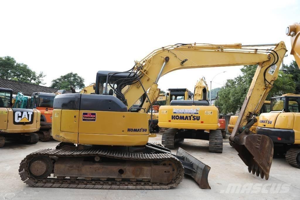 Komatsu PC 128 US Vidēja lieluma ekskavatori 7 t - 12 t