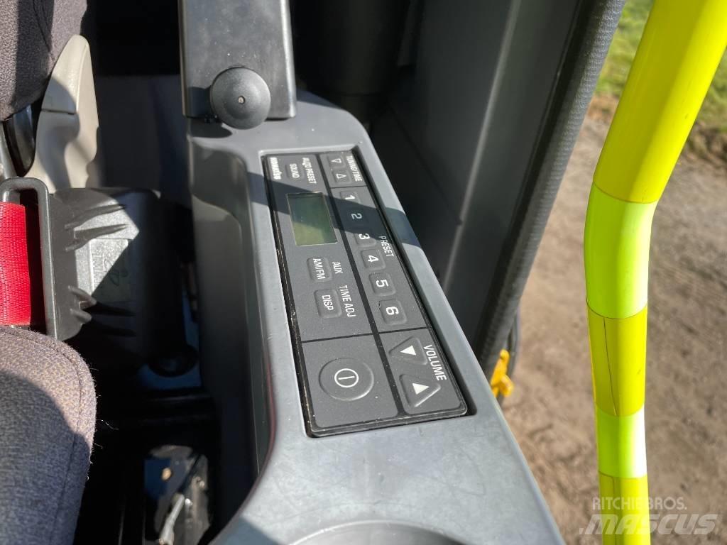 Komatsu PC 210 Ekskavatori tālās sniedzamības darbiem