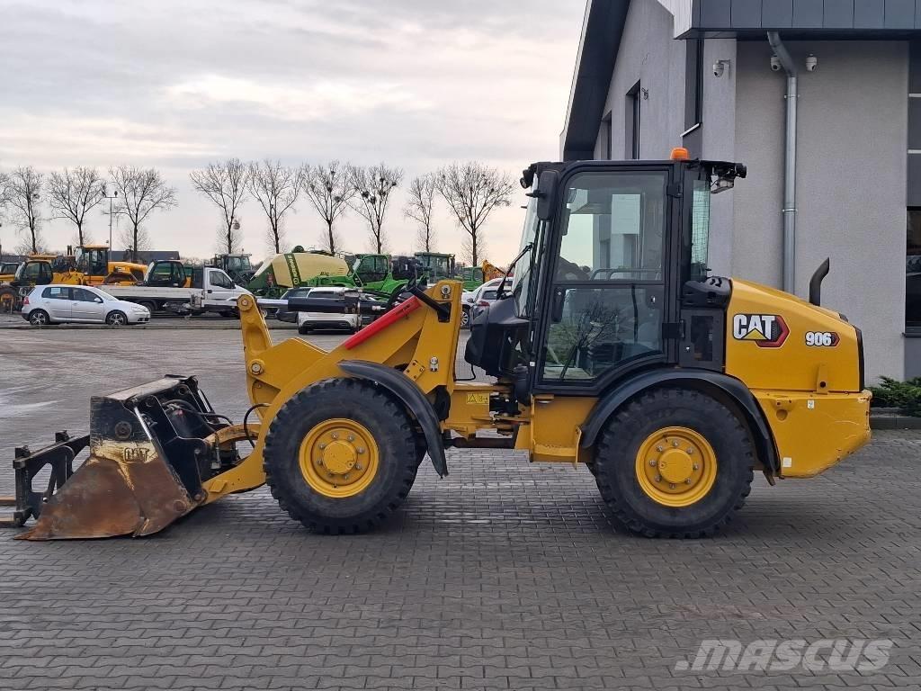 CAT 906 Iekrāvēji uz riteņiem