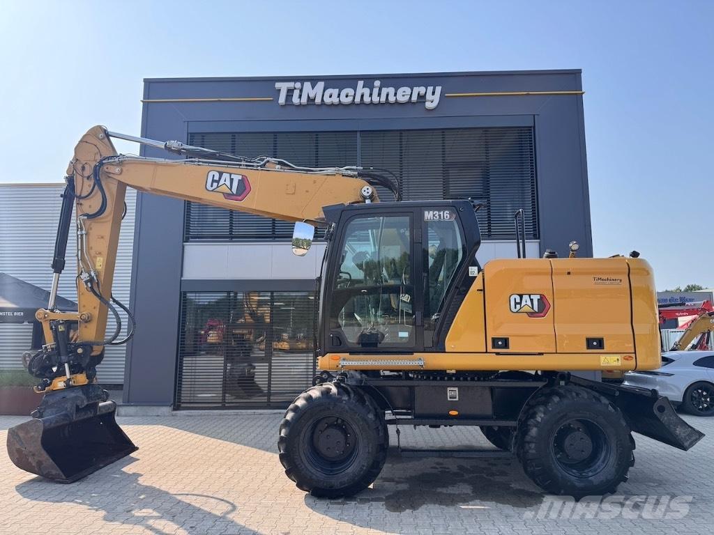 CAT M316 Ekskavatori uz riteņiem