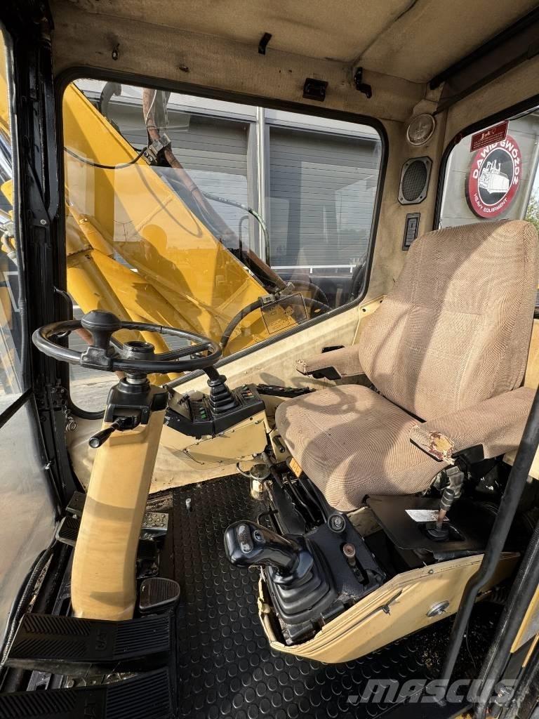 CAT M 315 Ekskavatori uz riteņiem