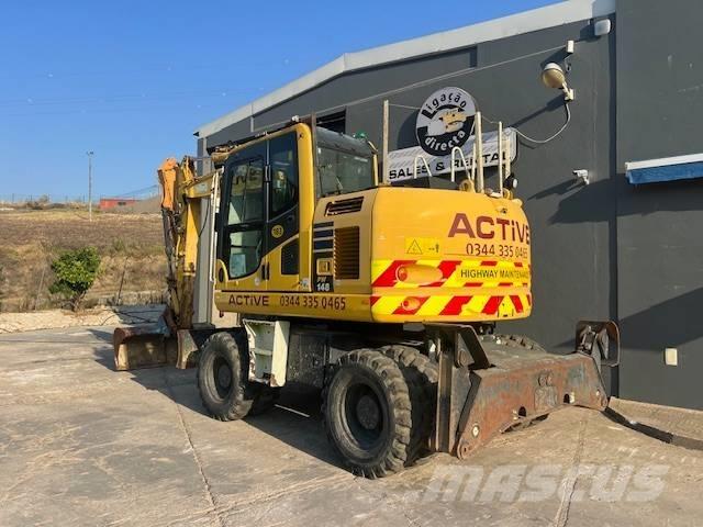 Komatsu PW 148 Ekskavatori uz riteņiem