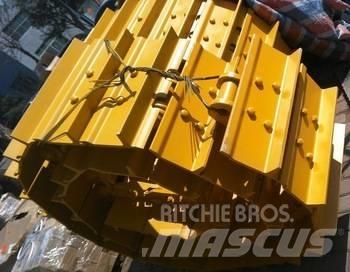 Komatsu D155A-6 Sliedes, ķēdes un šasija