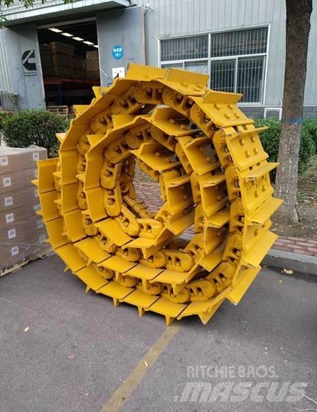 Komatsu D155A-6 Sliedes, ķēdes un šasija