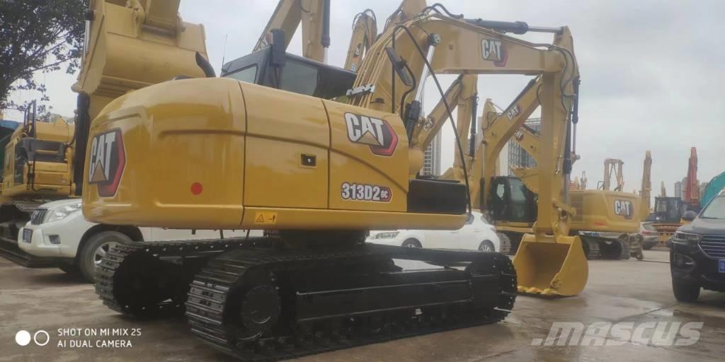 CAT 2021 CAT 313D2GC Ekskavatori uz riteņiem