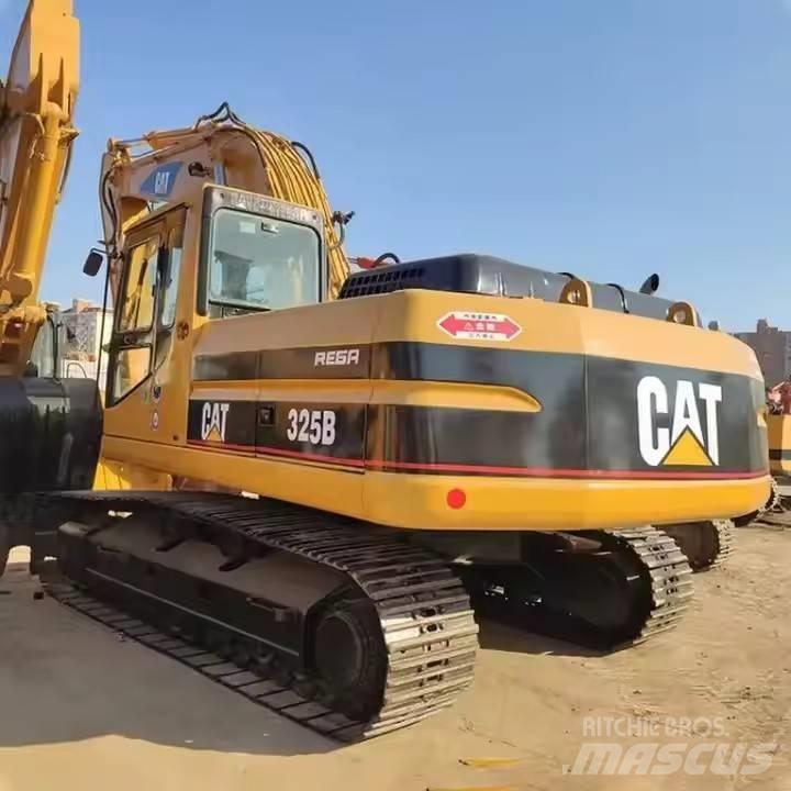 CAT CAT323B Vidēja lieluma ekskavatori 7 t - 12 t