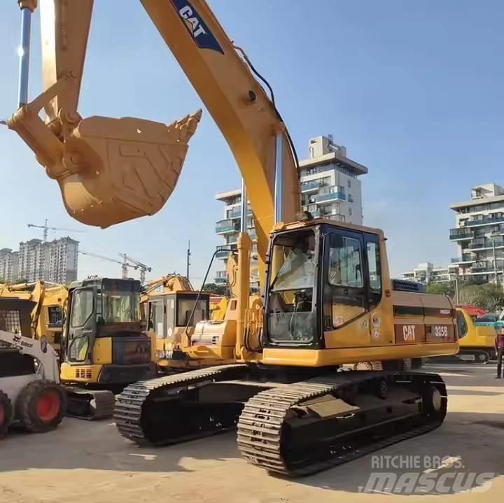 CAT CAT323B Vidēja lieluma ekskavatori 7 t - 12 t