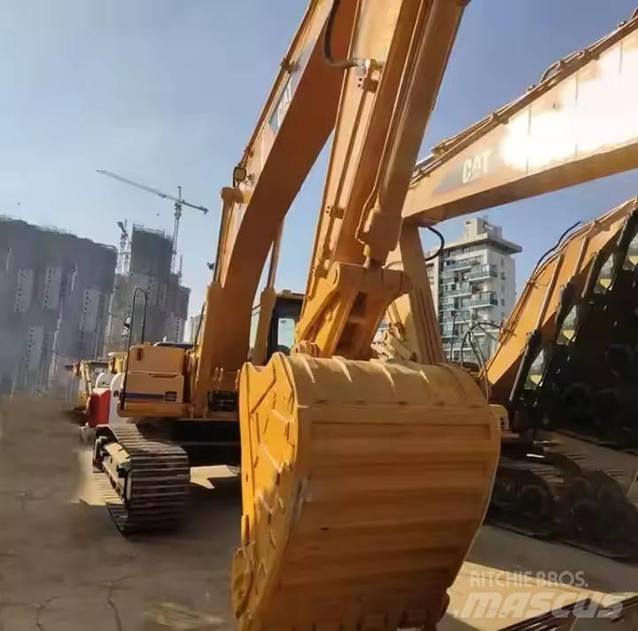 CAT CAT323B Vidēja lieluma ekskavatori 7 t - 12 t