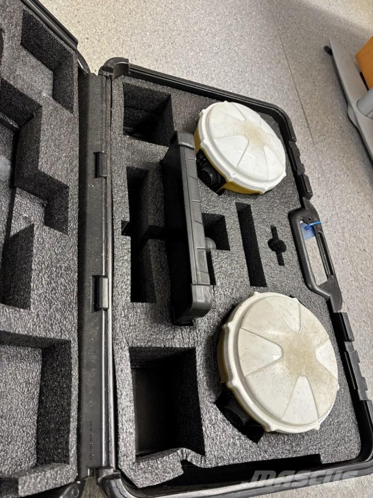 CAT M 318 Ekskavatori uz riteņiem