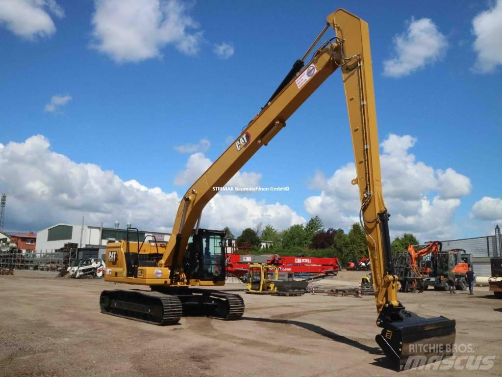 CAT 323 LR Ekskavatori tālās sniedzamības darbiem