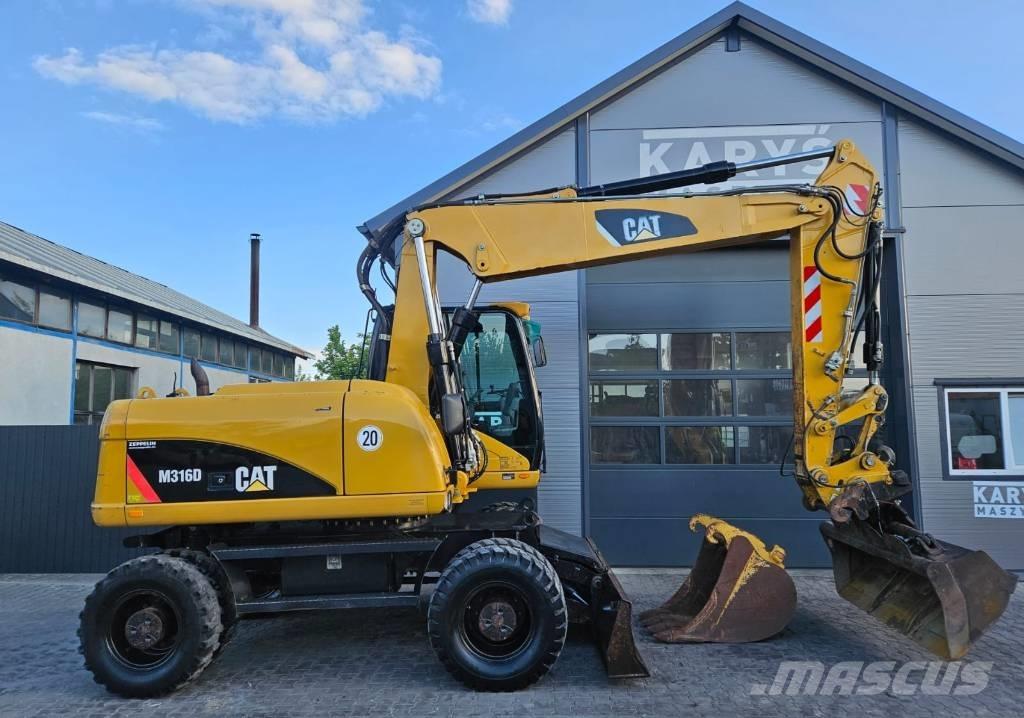 CAT 316D Ekskavatori uz riteņiem