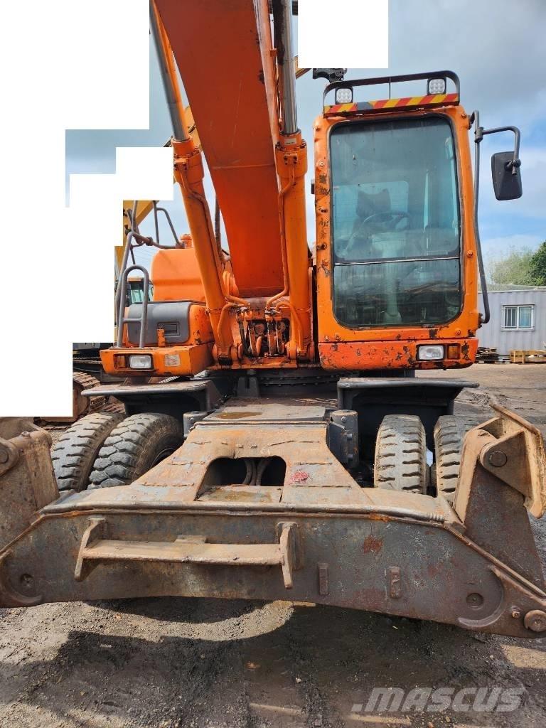 Doosan DX 210WA Ekskavatori uz riteņiem