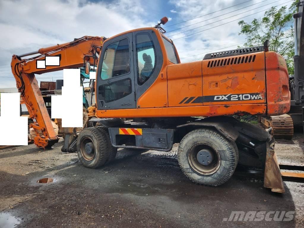 Doosan DX 210WA Ekskavatori uz riteņiem