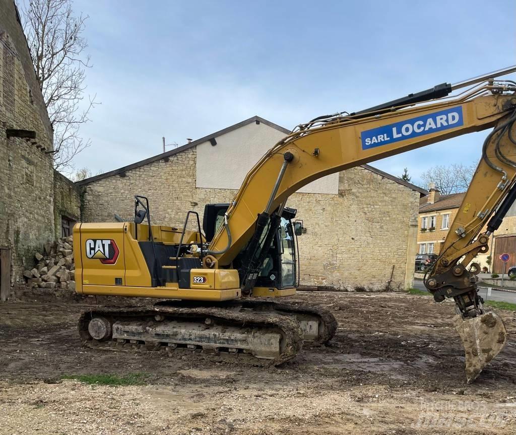 CAT 323 Kāpurķēžu ekskavatori