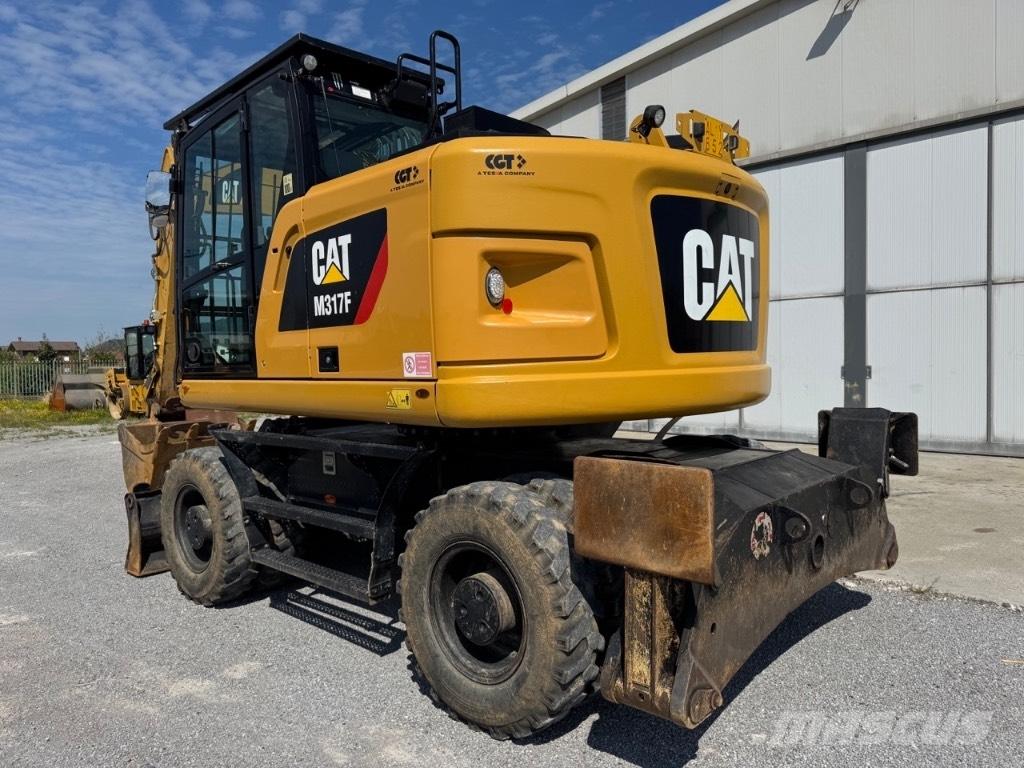 CAT M317F Ekskavatori uz riteņiem