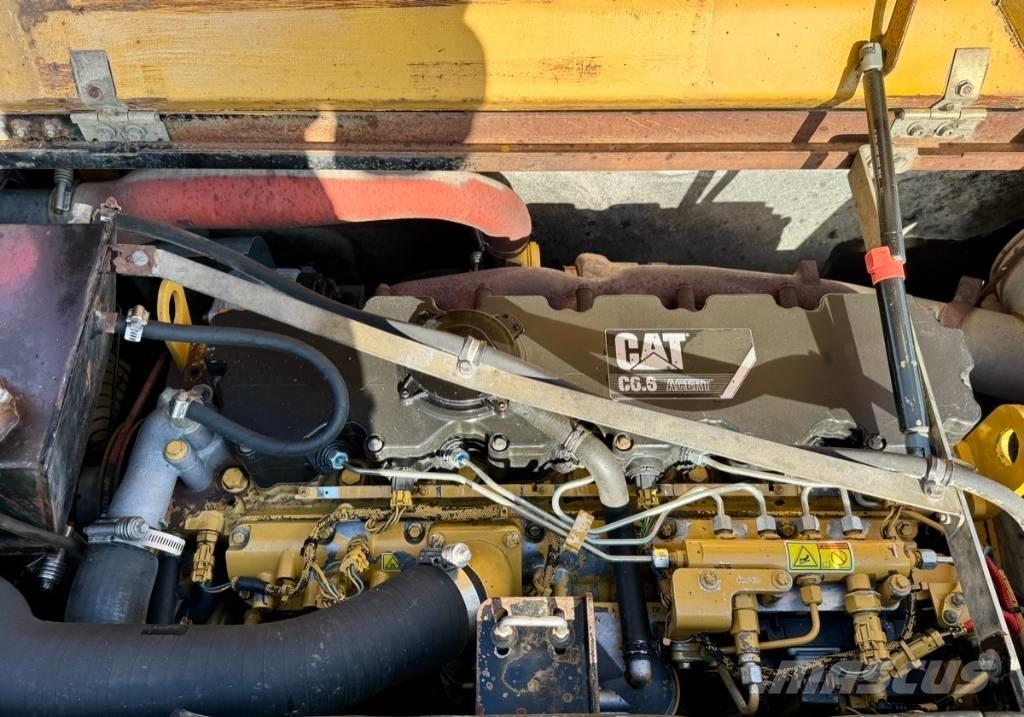 CAT M 318 D Ekskavatori uz riteņiem