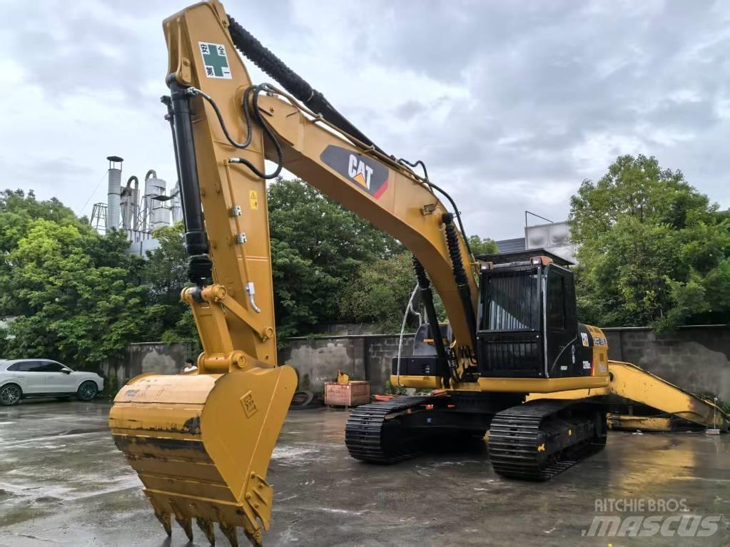 CAT 320D2 Vidēja lieluma ekskavatori 7 t - 12 t