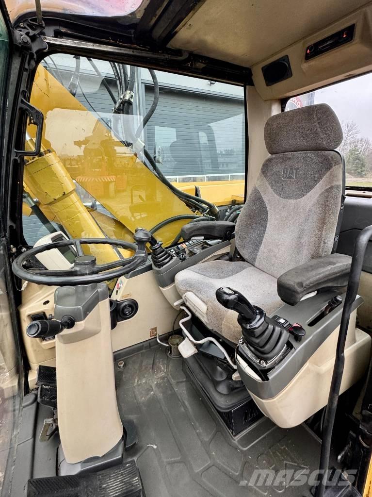 CAT M 316 C Ekskavatori uz riteņiem