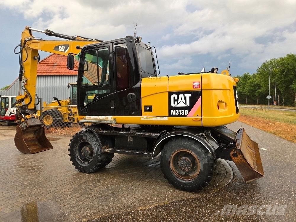 CAT M313D Ekskavatori uz riteņiem