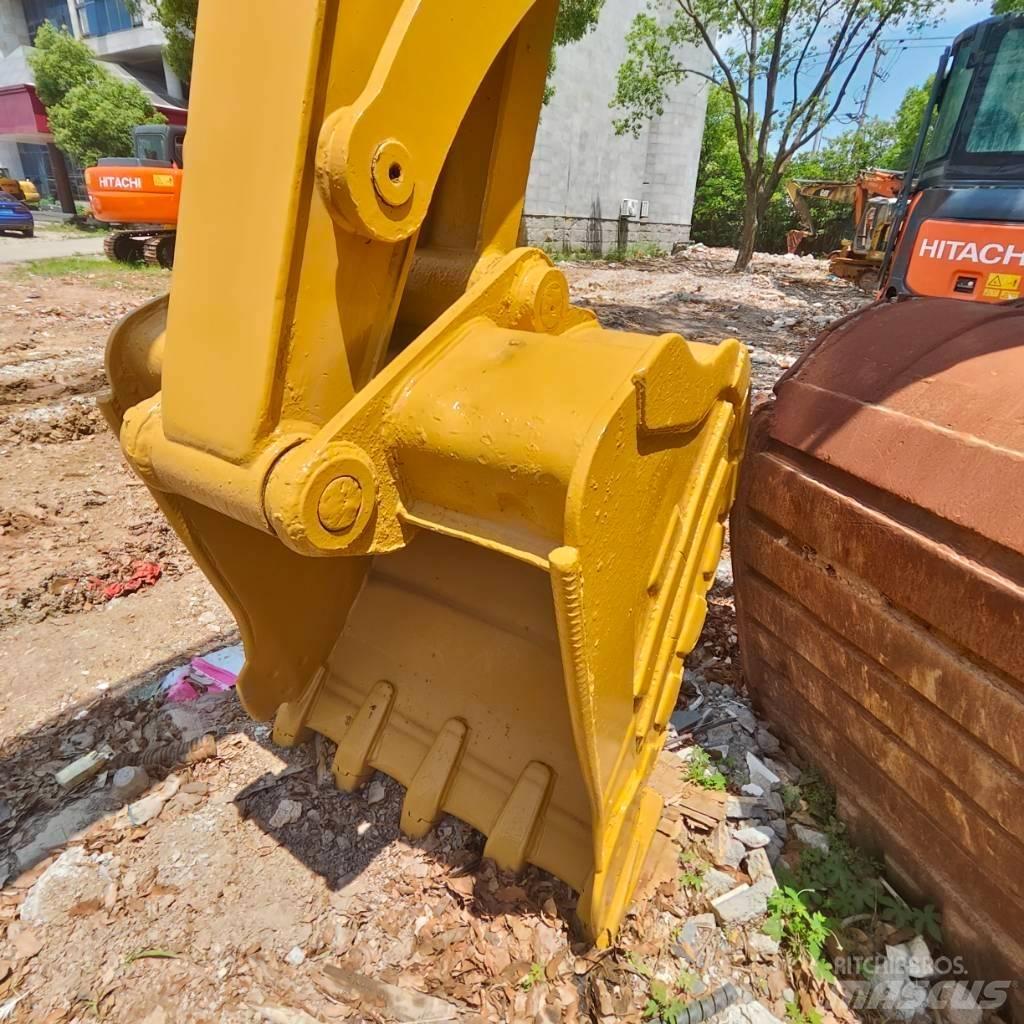 CAT 310 Kāpurķēžu ekskavatori