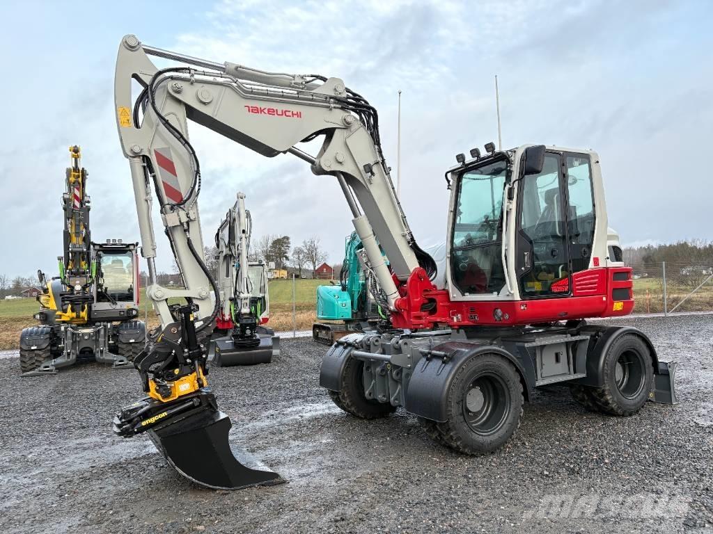 Takeuchi TB395W Ekskavatori uz riteņiem