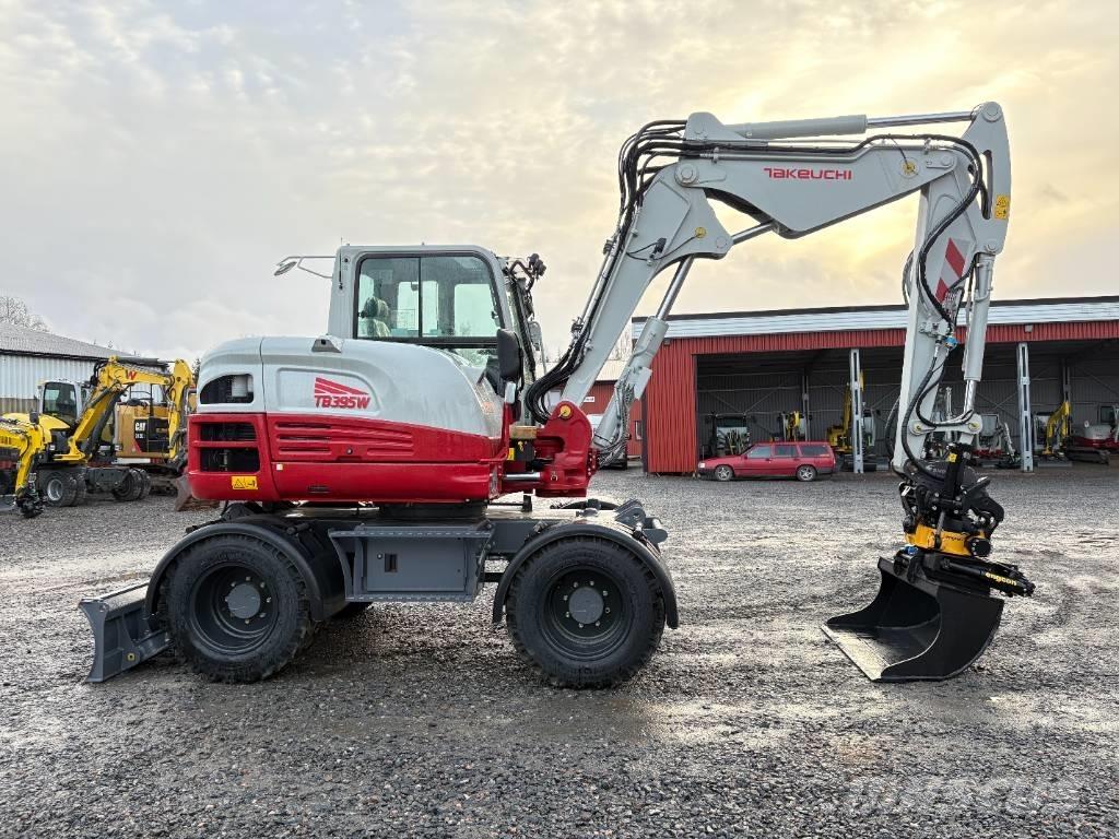 Takeuchi TB395W Ekskavatori uz riteņiem
