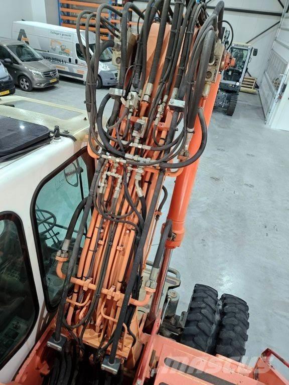 Atlas 1404 Ekskavatori uz riteņiem